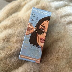 New Undefined Beauty R&R Broad Spectrum SPF 50 Sun Serum - medium tint